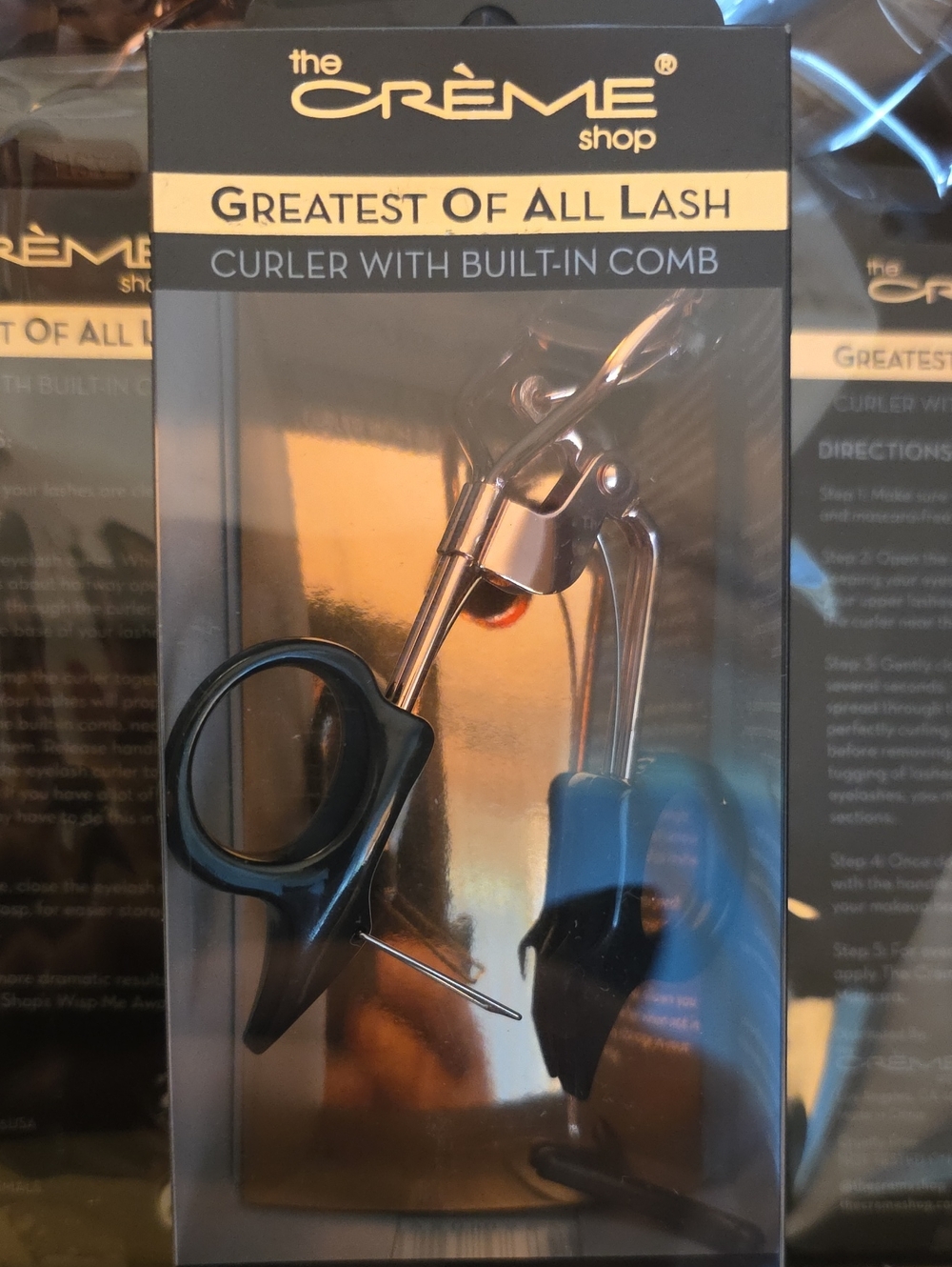 The Crème Shop Greatest Of All Lash Curler with Built-In Comb - Black